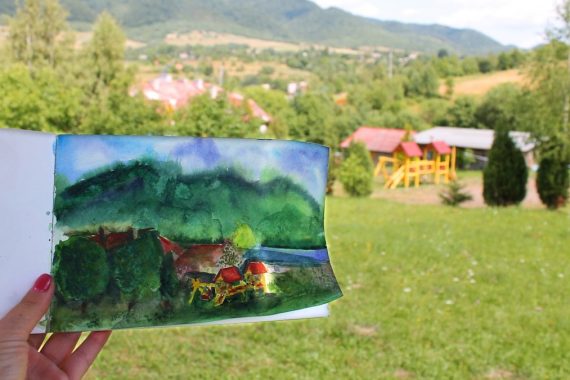 Watercolor drawing in the mountains